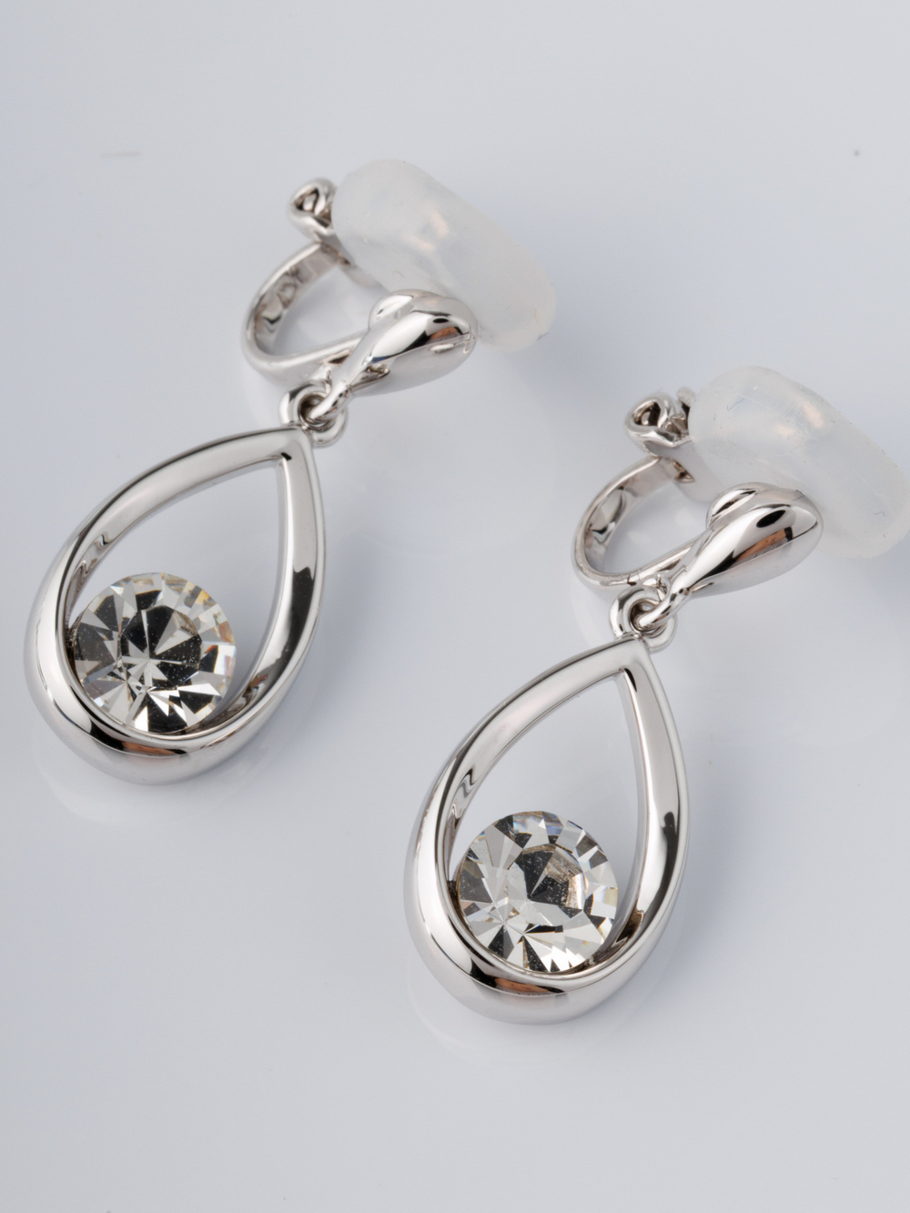Клипсы-капли Белла с белыми кристаллами Swarovski в родии