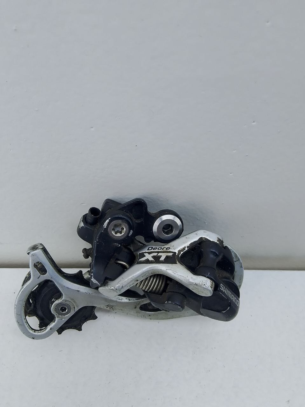 Переключатель на велосипед Shimano Deore XT RD-M771 (задний)