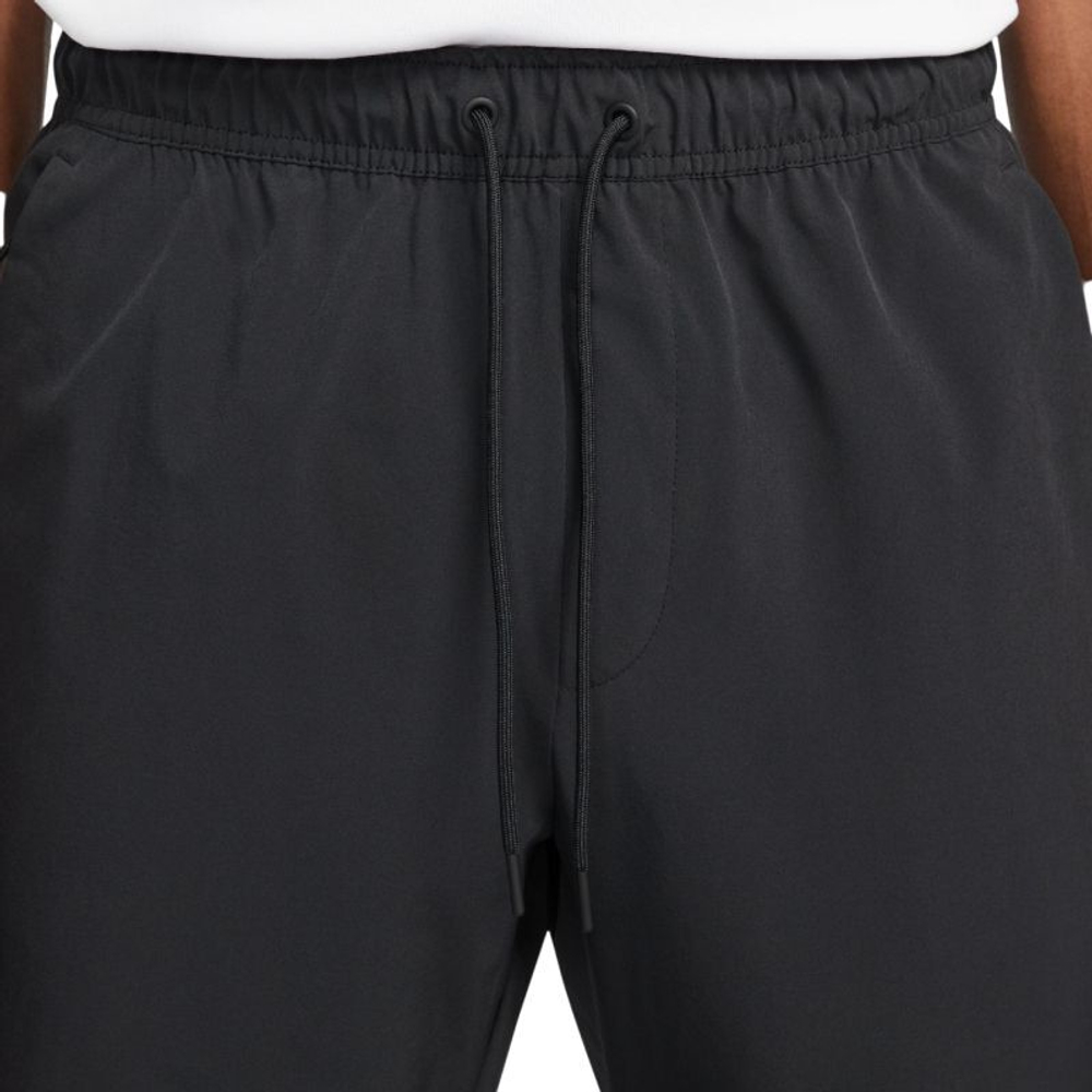Мужские теннисные штаны Nike Unlimited Dri-Fit Zippered Cuff Versatile - черный