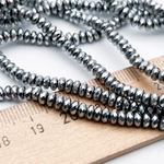 Гематит Рондель с огранкой (имитация), цвет серебристый, размер около 2,2*4 мм, цена за 19 см (1/2 нити)