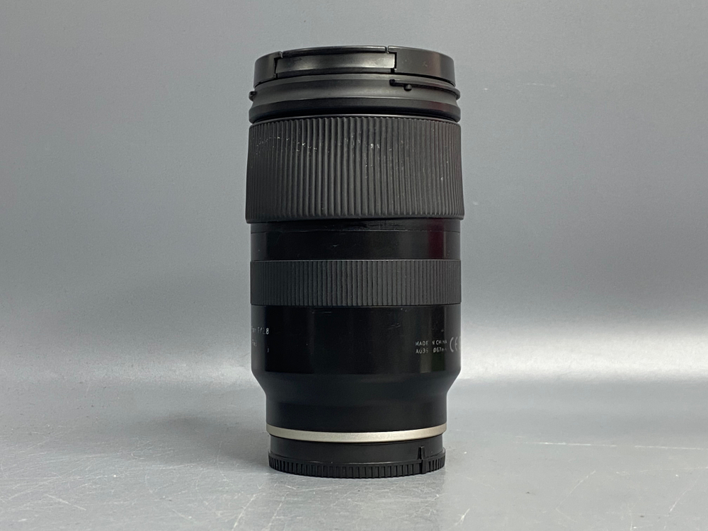 Tamron 28-75mm 2.8 Di III RXD Sony E пыль внутри линзы