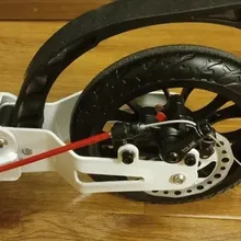 Складной двухколёсный самокат Micar Storm Pro 200 мм с двумя амортизаторами и ручным дисковым тормозом, белый