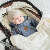 Шапка зимняя на завязках с помпоном "Крем" 0+