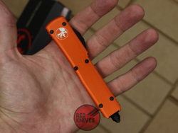 Нож Microtech Ultratech T/E - оранжевая рукоять, танто черный клинок RK-365