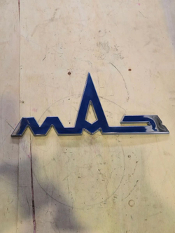 Знак заводской (ЕВРО эмблема в "хроме", оао "МАЗ") 6430-8401300-010
