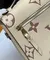 Сумка LOUIS VUITTON Pochette Métis с крупным тисненым узором