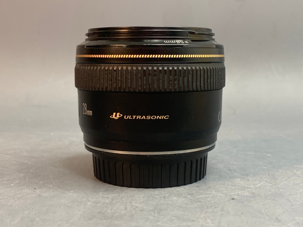 Canon EF 28mm 1.8 USM царапка на передней линзе
