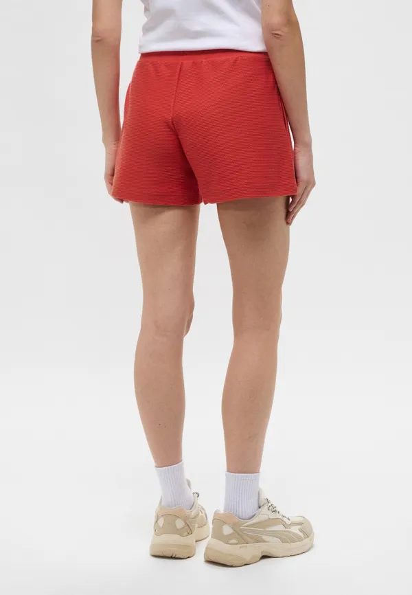 Шорты спортивные женские PUMA PREMIUM ESS A-Line Shorts 4' Jacquard