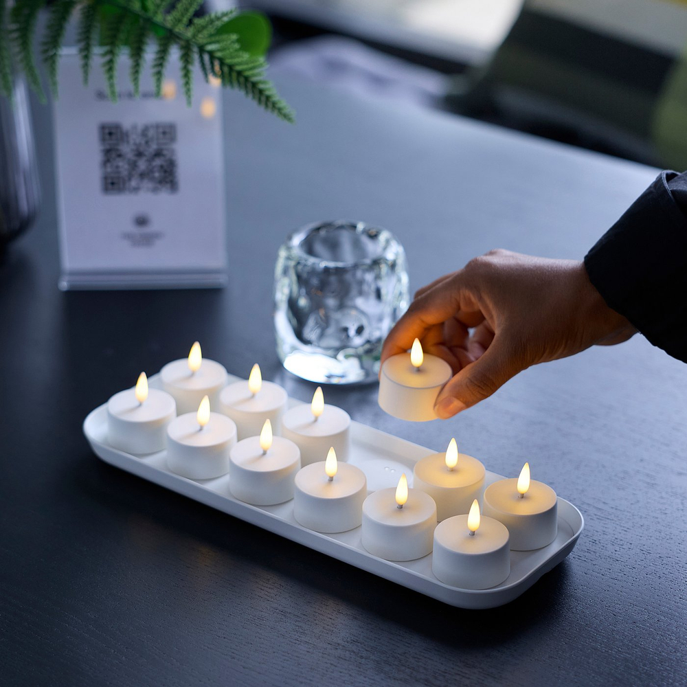 IKEA SKATGÅS  (ИКЕА СКАТГОС)  -  Набор чайных свечей LED - с зарядной подставкой белый