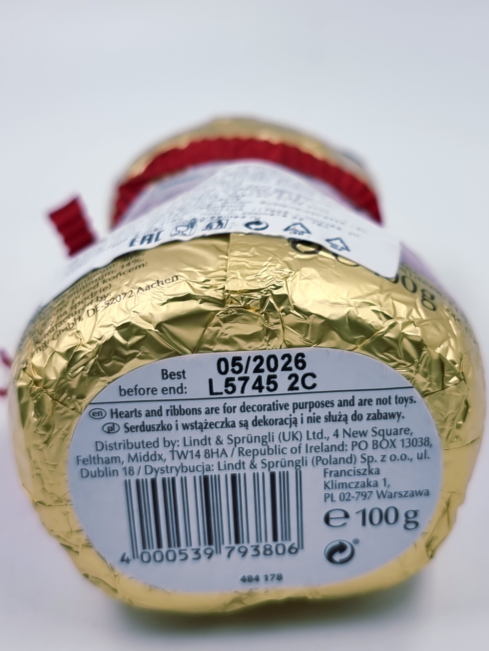 Lindt Teddy Шоколад молочный в форме Мишки, красный/розовый 100 г 1 шт (Германия)