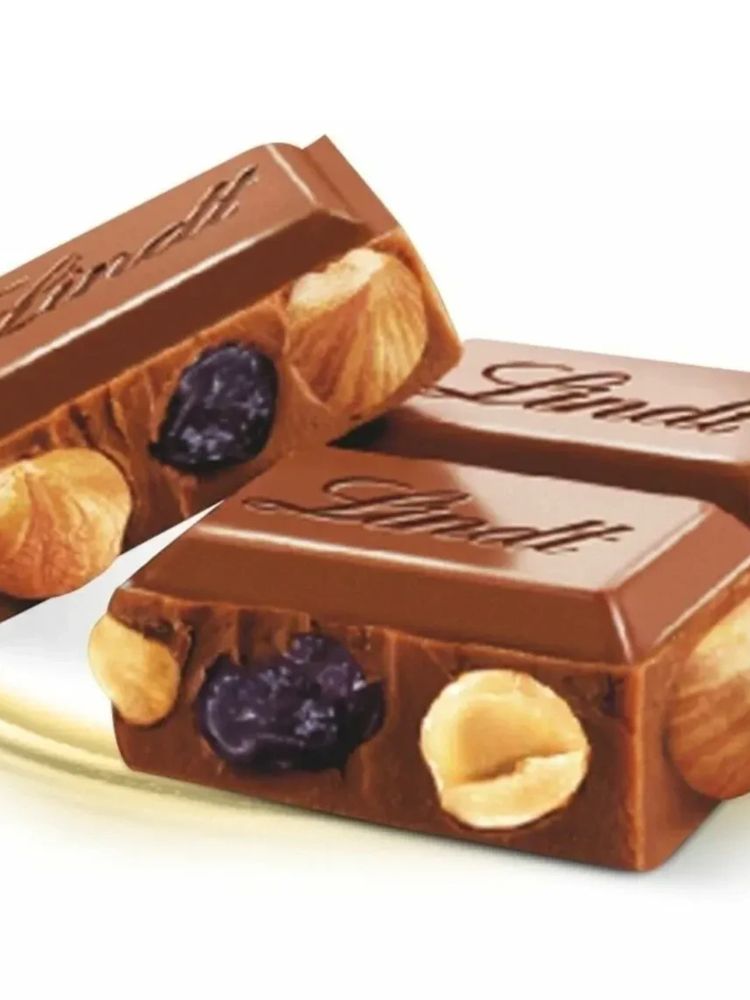 Молочный шоколад Lindt Фундук и изюм 300 г