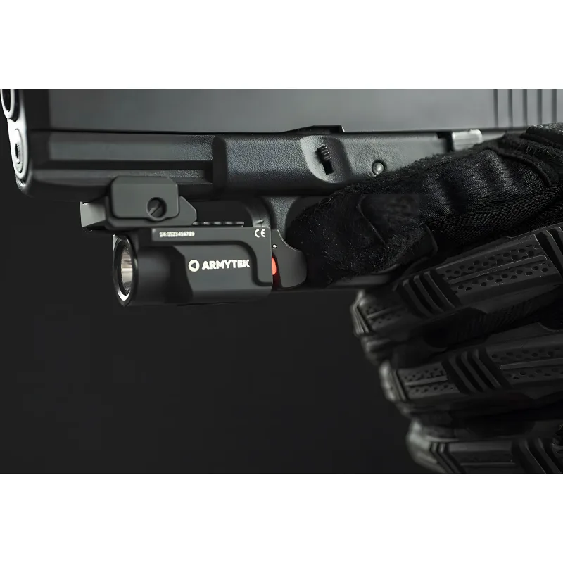Тактический пистолетный фонарь Armytek Buckler M1 - вид сбоку, установленный на оружии