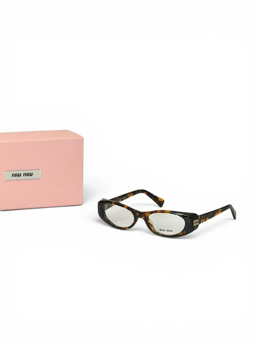 Солнцезащитные очки MIU MIU