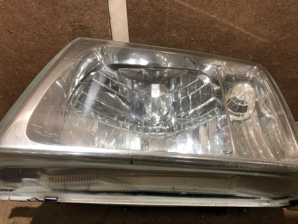 Фара левая Toyota Land Cruiser 100 98-05 Б/У Оригинал 8105960041