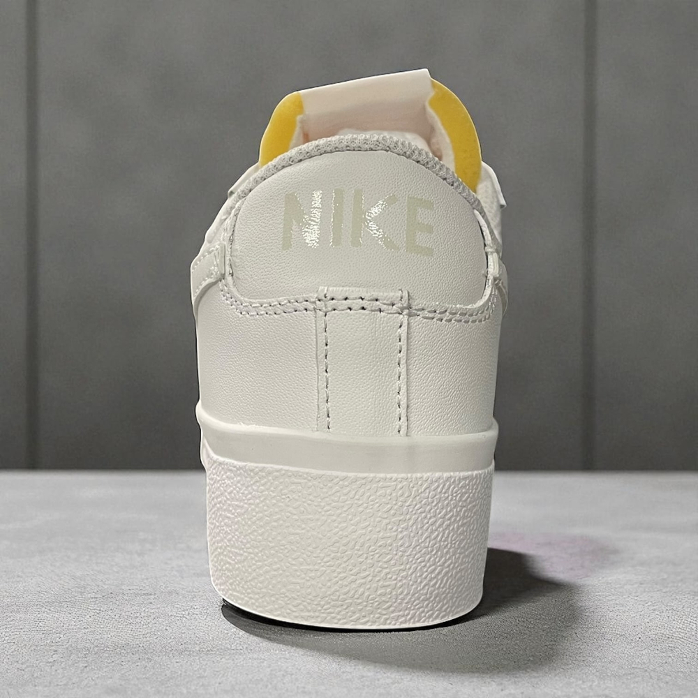 Nike Blazer Low Platform • Triple White