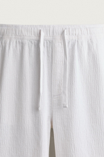 БРЮКИ RELAXED FIT ИЗ ЖАККАРДА С ЭФФЕКТОМ ПОТЕРТОСТИ — ZARA