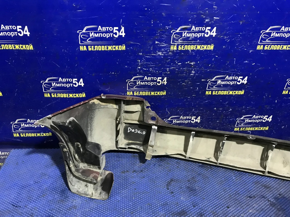 Бампер задний MAZDA DEMIO 2000