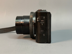 Canon PowerShot G7X Mark II немного пыли внутри объектива