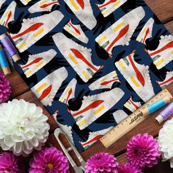 Ткань флис белые кроссовки с ярким рисунком на синем фоне