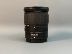 Nikon 24-70mm 4S Nikkor Z царапки на передней линзе