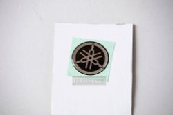 2DP-F413B-00. EMBLEM. NMAX GPD150A, NMX, N-Max