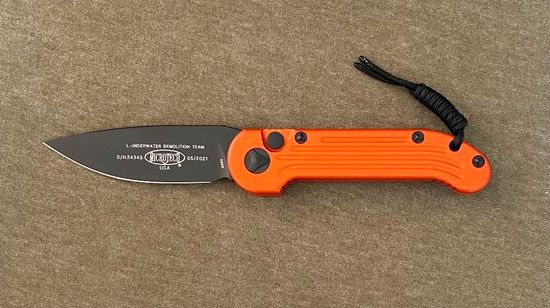 Складной нож Microtech LUDT MT/135-1OR c клинком из стали Böhler M390 Microclean®, рукоять алюминий