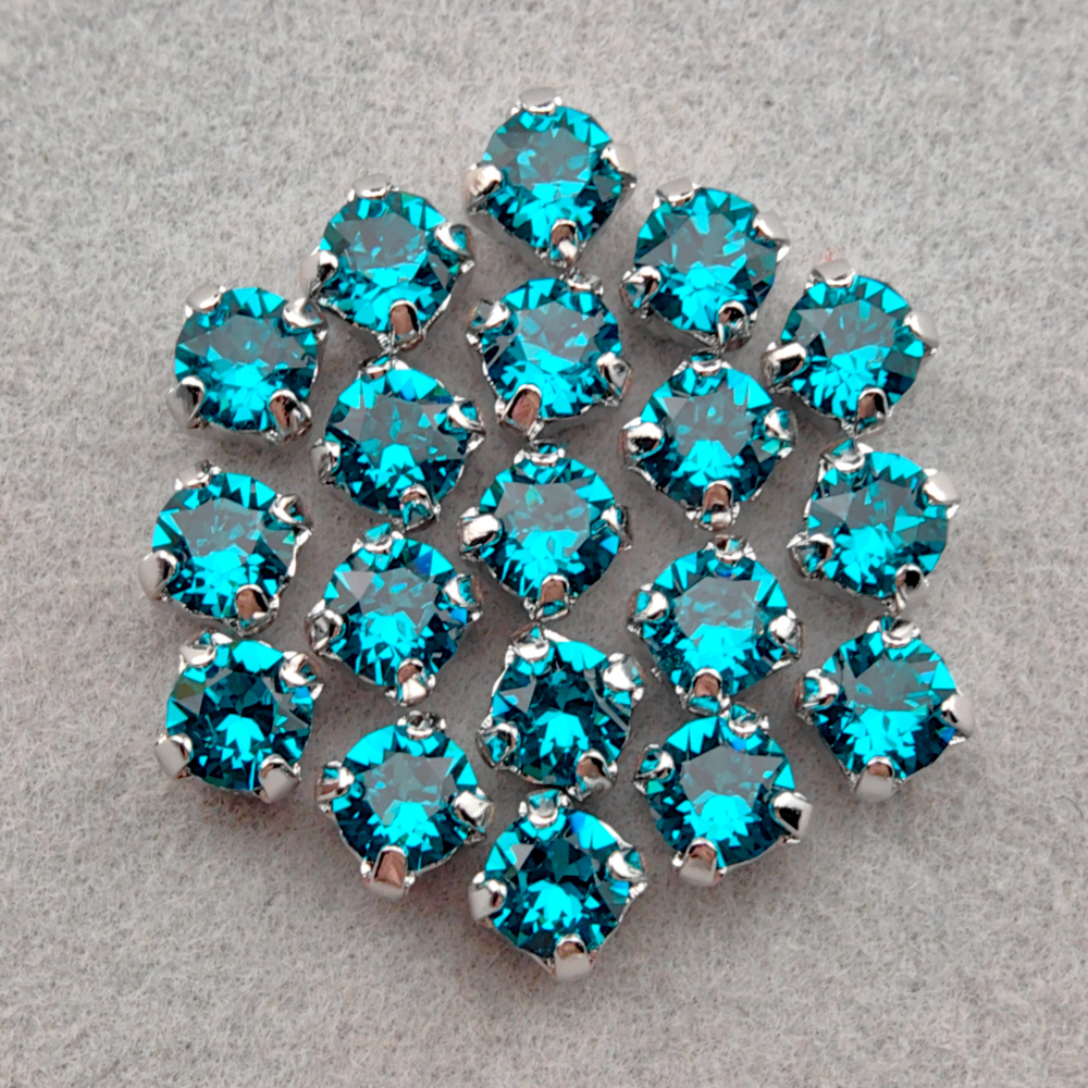 Шатоны Swarovski 1088 в оправах, цвет Голубой циркон/родий (Blue Zircon/Rhodium)