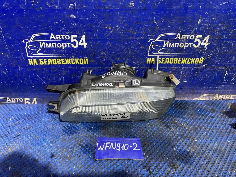 Фара передняя левая NISSAN WINGROAD 1996