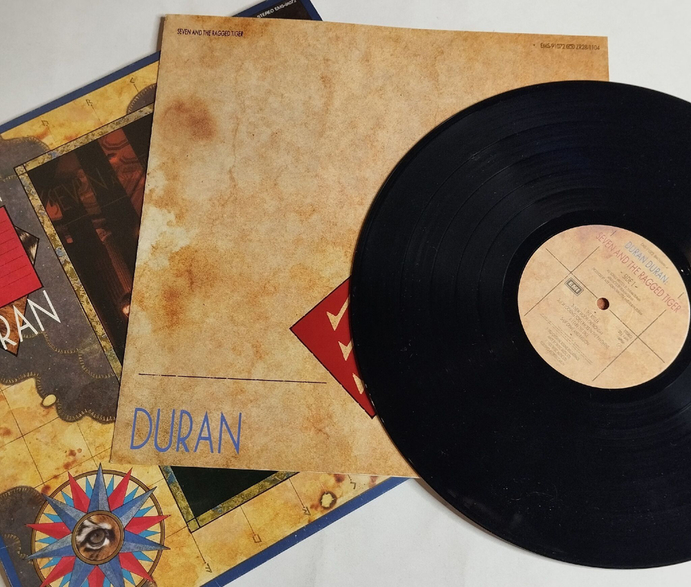 Винтажная виниловая пластинка LP Duran Duran Seven And The Ragged Tiger (Japan 1983) (No Obi) New Moon On Monday
