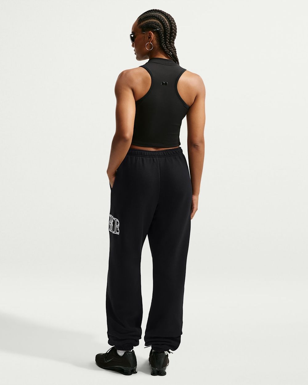 Брюки спортивные женские NIKE W NK STDO FLC MW OS LGO CF PNT