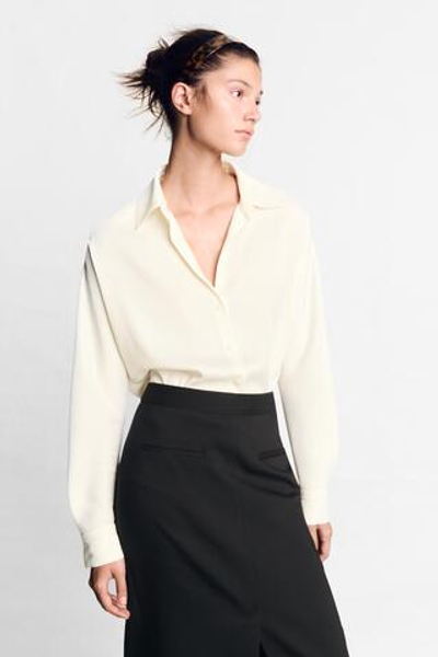 СТРУЯЩАЯСЯ РУБАШКА С ОБТЯНУТЫМИ ПУГОВИЦАМИ — ZARA
