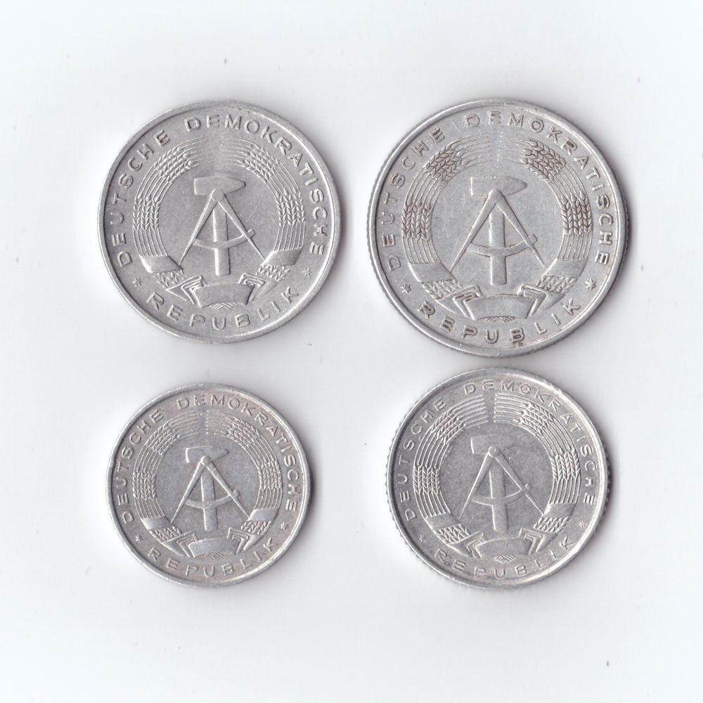 Набор монет. Германия. ГДР. 4 шт. 1,2 марки. 10,50 пфенинг 1957,62,71,68 гг. Большой герб. XF