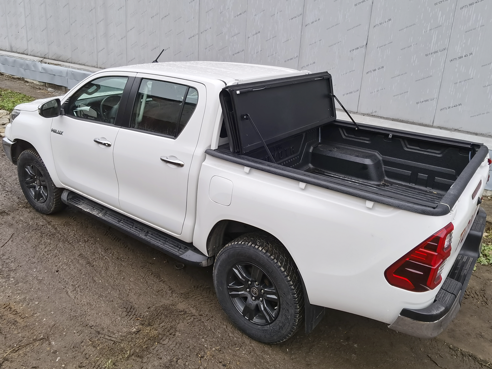 Крышка HAL 4-х секционная STANDART HILUX 2015+ Араб. версия, штат. защ. стекла, вкладышь