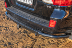 Бампер задний силовой/защита штатного бампера Toyota Land Cruiser 200 2007-2015 c квадратом под фаркоп, стандарт РИФ