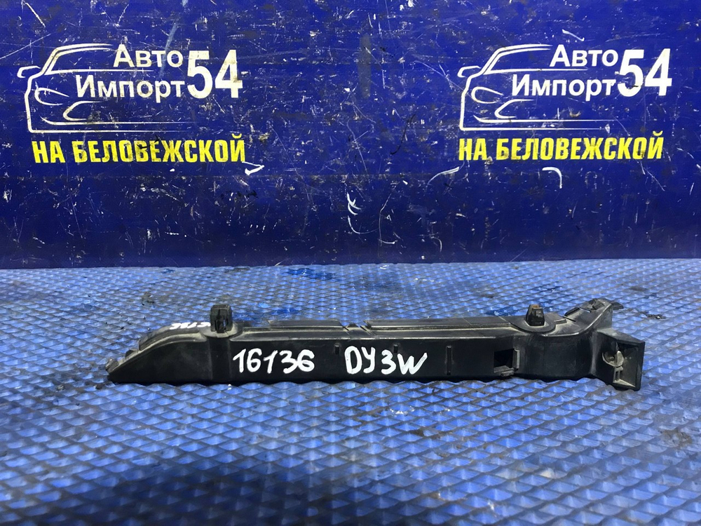Крепление бампера переднее левое MAZDA DEMIO 2002-2005