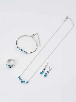 Жесткий браслет Эльза с синими камнями Swarovski