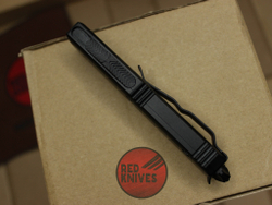 Нож Microtech UTX-85 A+++ Hellhound H/E - черная рукоять, черный клинок