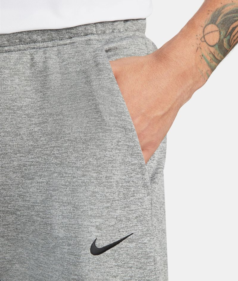 Теннисные брюки Nike Therma-FIT Tapered Fitness Pants - dark grey heather/particle grey/black - Gray