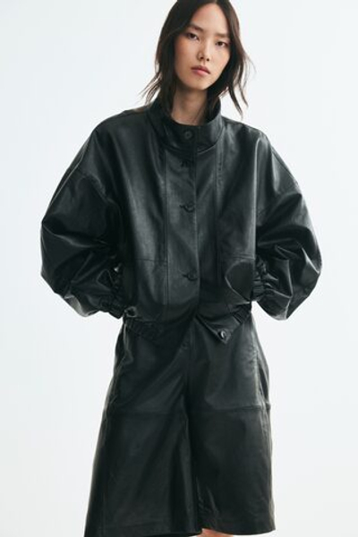 Куртка из ткани с покрытием с воротником-трубой - H&M