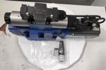 4WRTE16V200L-4X/6EG24K31/A1M - Пропорциональный быстродействующий распределитель с обратной связью по положению золотника и со встроенным усилителем (OBE), Ду16, A1 = ±10 В, номинальный расход 200 л/мин, схема V, каналы управления X и Y = внешние