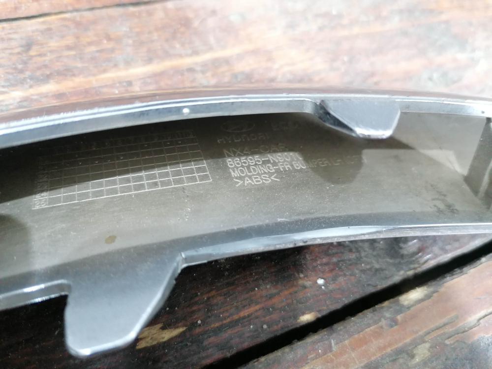Молдинг переднего бампера левый Hyundai Tucson 4 (NX4) 20-нв Б/У Оригинал 86595N9010