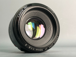 Canon EF 50mm 1.8 II пыль под линзой