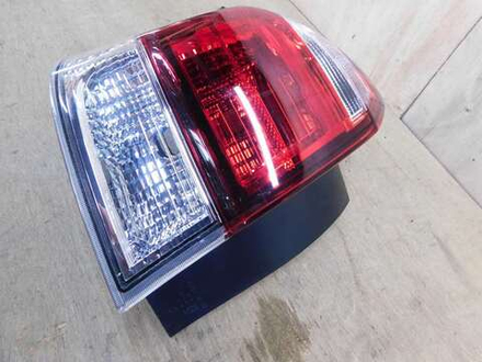 стоп левый Toyota Corolla Fielder NZE161 164 165 13-106