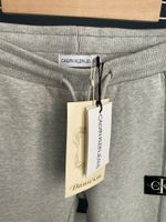 Новые хлопковые брюки Calvin Klein, 140
