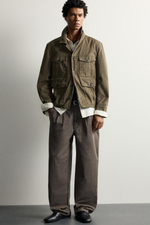 БРЮКИ RELAXED FIT С ЭФФЕКТОМ ПОТЕРТОСТИ И СКЛАДКАМИ — ZARA