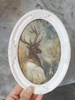 Картина в овальной рамке