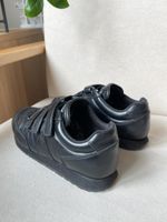 Кроссовки Prada