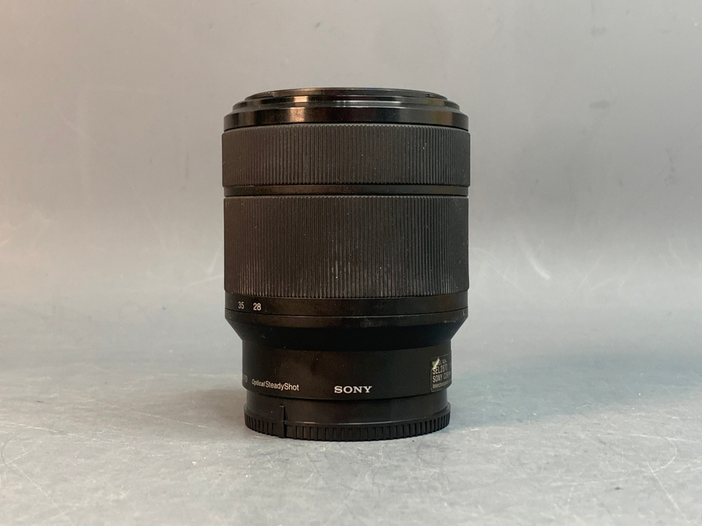 Sony FE 28-70mm f/3.5-5.6 OSS, царапки на передне линзе