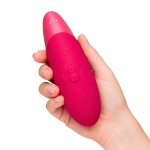 Розовый бесконтактный клиторальный вибростимулятор Womanizer Enhance Pink Vibrant WZSN1SG2