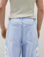 Мужские джинсы super baggy fit с боковым принтом - BERSHKA